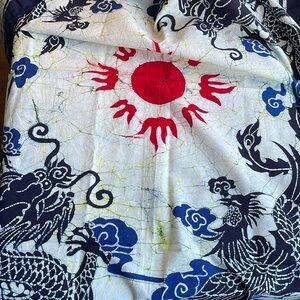 Indonesian Batik fabric, dark indigo blue/black contrast, red sun/flower motif